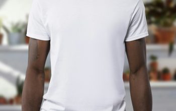 man wearing white crew-neck t-shirts